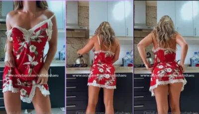 Lais Exibidinha de vestido curto na cozinha de casa