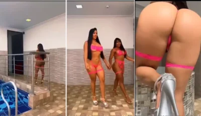 Vanessa Roa de biquini com amiga morena na piscina