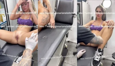 Amadora Mari Ladeira colocando piercing na buceta