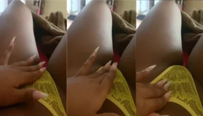 Indiiazinha25 passando a mão na xota por cima da calcinha
