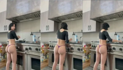 Veronica Perasso cozinhando de calcinha